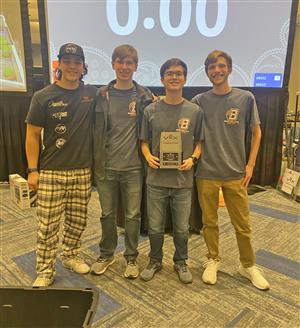 4 Bridgeland robotics students with an award